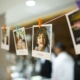 Instant photos of children hanging on a string